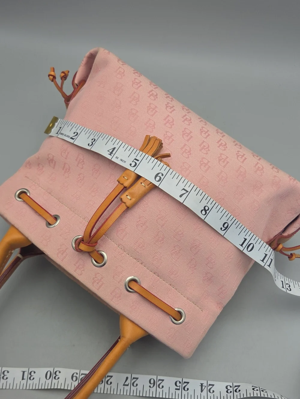 Dooney Bourke DB Monogram Drawstring Tote Canvas Leather Tassel Pink